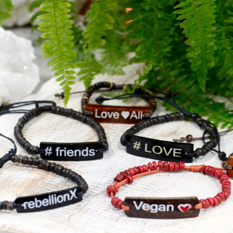 Slogan bracelet from Coco Rebellion X featuring bold lettering.