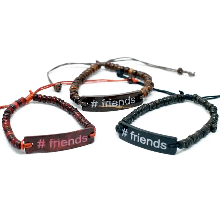 Coco friends slogan bracelet visible against a neutral background