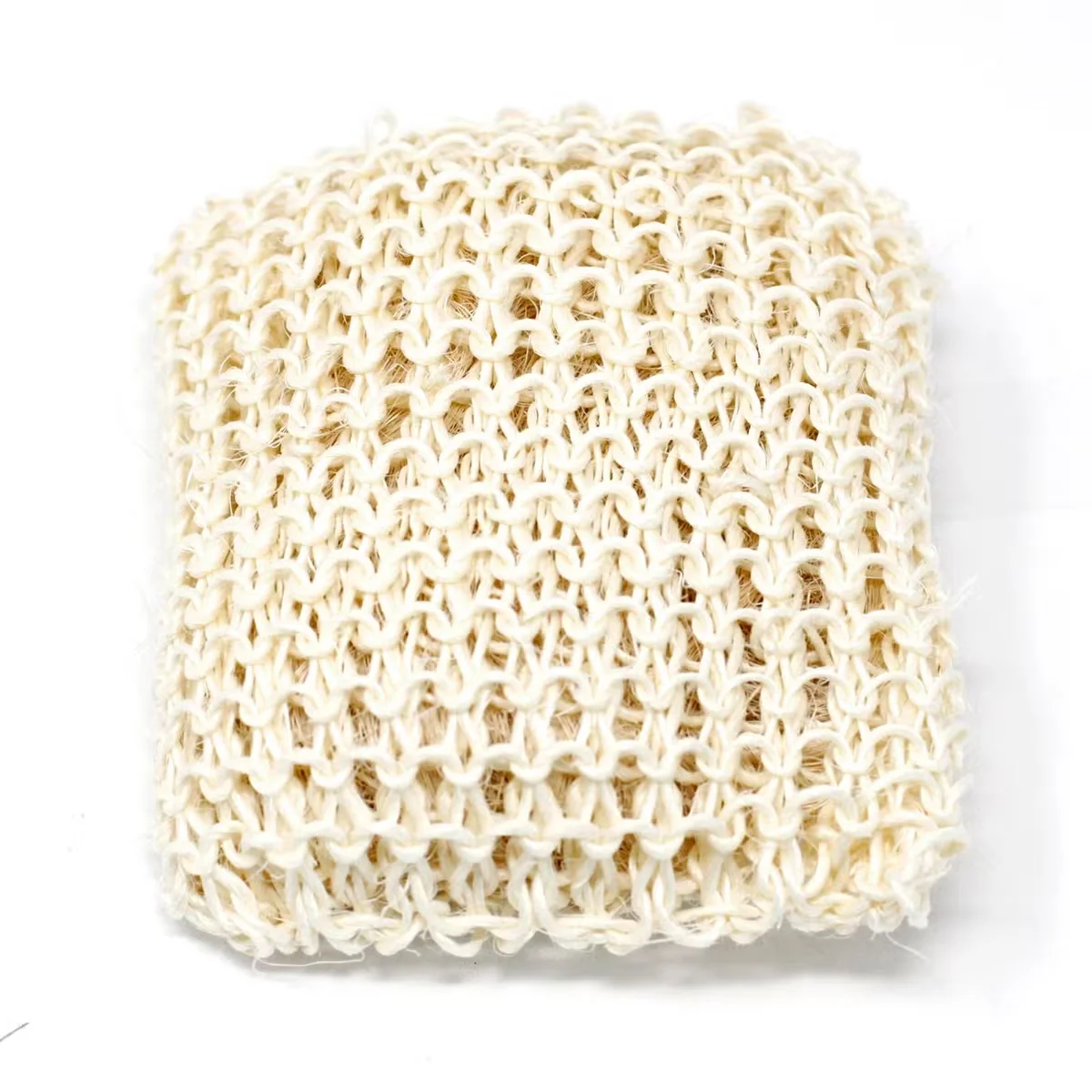 Extra exfoliating sisal sponge and scrub cushion for bath exfoliating scrub, natural texture visible