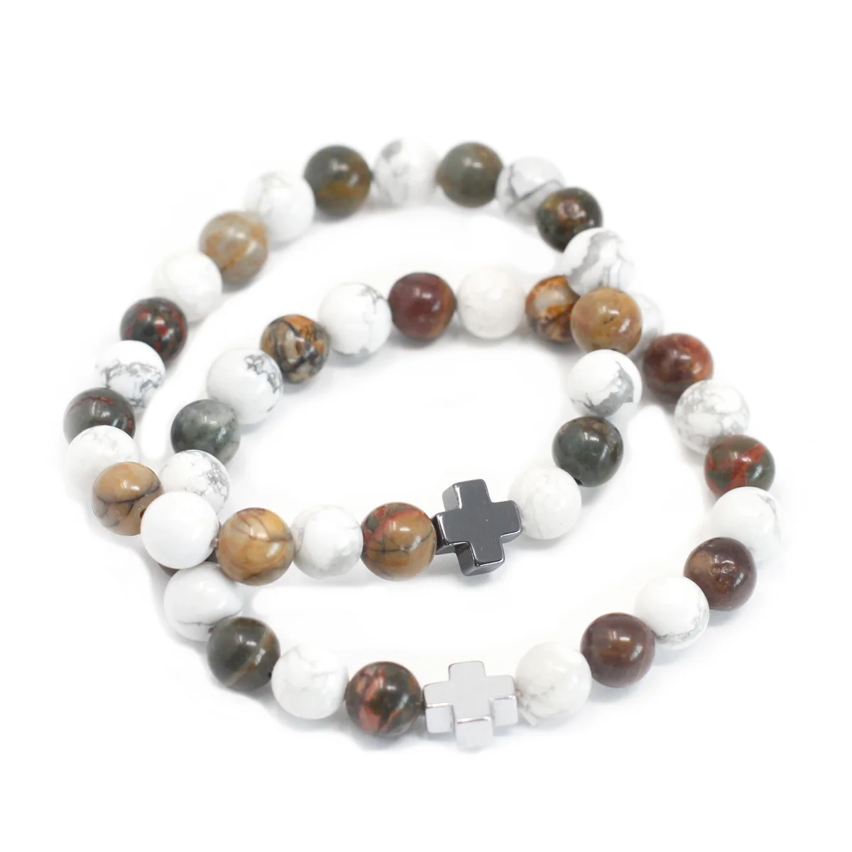 Two friendship bracelets featuring Picasso Jasper bracelet and White Howlite beads on a white background