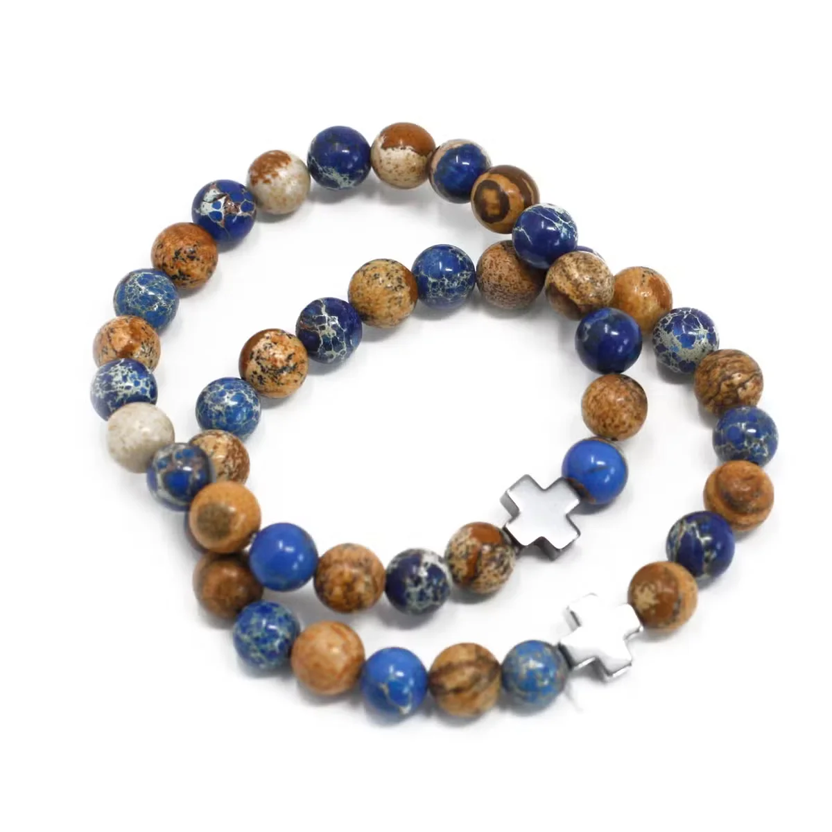 Two gemstone friendship bracelets, one in sodalite, the other a picture stone bracelet, displayed together.