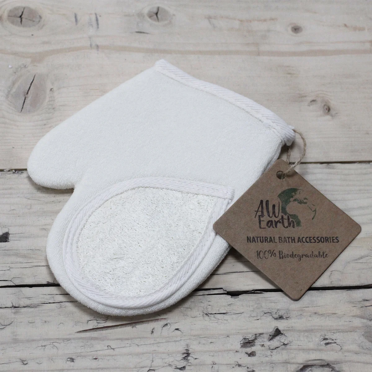 Bath loofah scrub glove, natural loofah fibres visible, displayed in neutral colour.