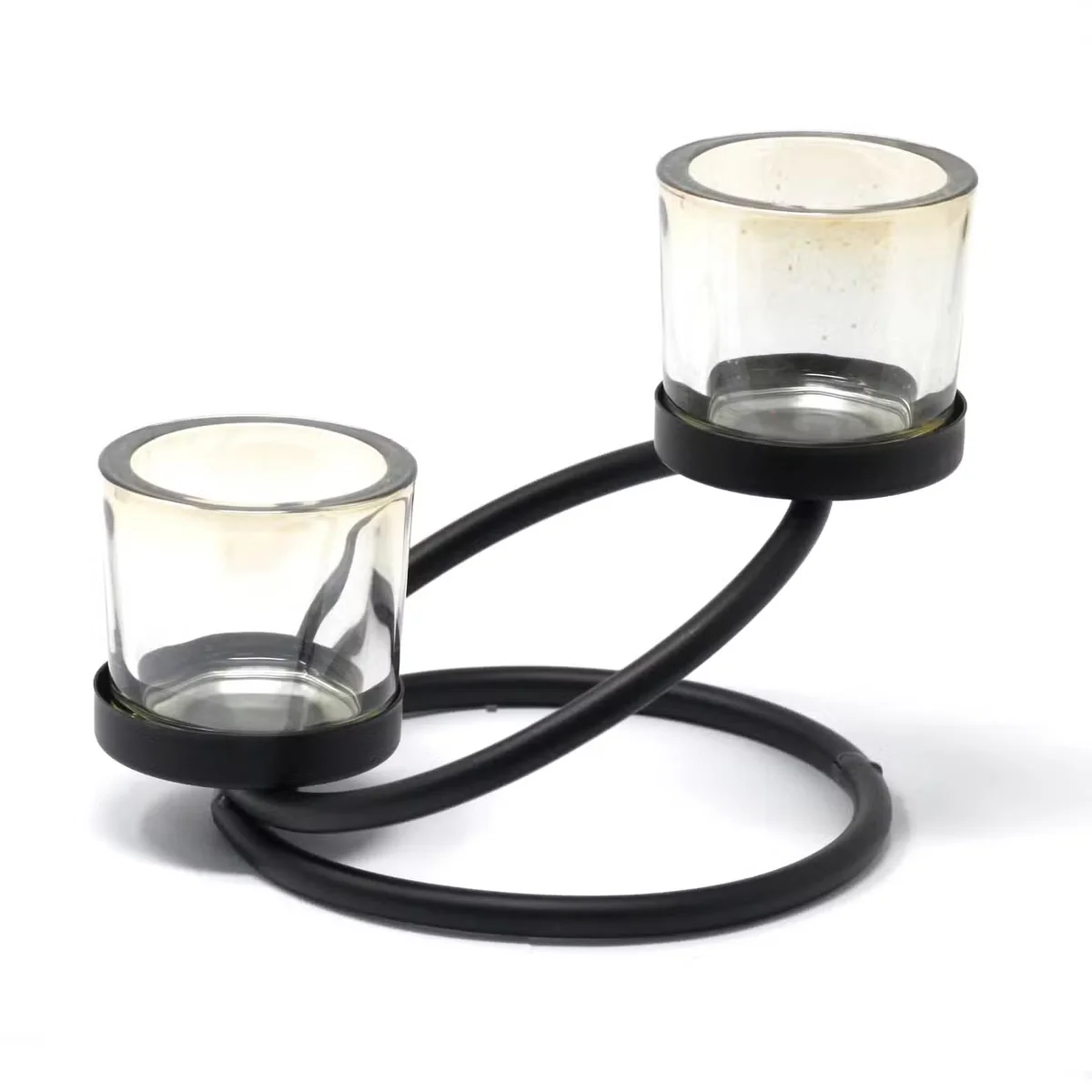 Iron centrepiece candle holder with two cups arranged in a double step design