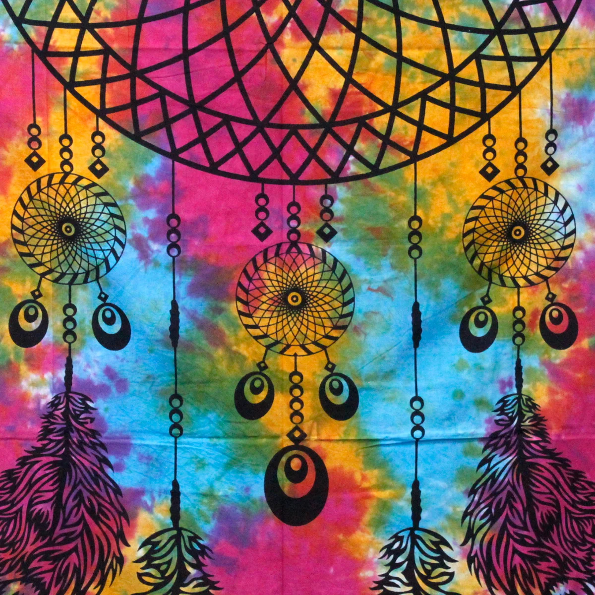Double cotton bedspread paired with a wall hanging garment, showcasing a cohesive bedroom wall art ensemble
