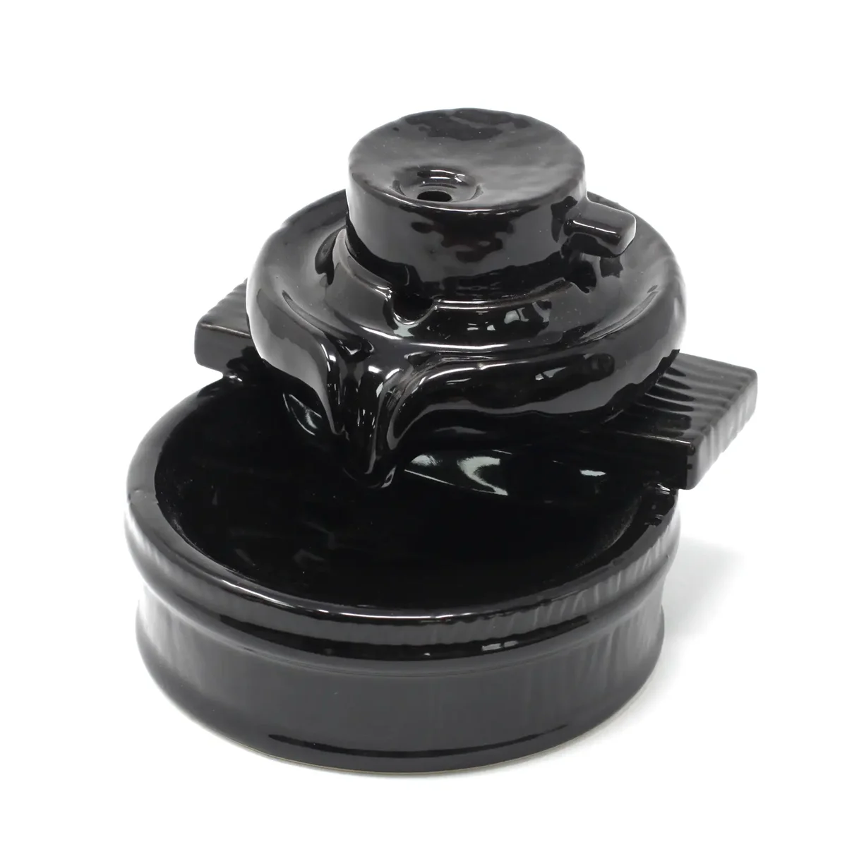 Ceramic zen incense burner with backflow design releasing smoke, called Zen Flow, on a plain background