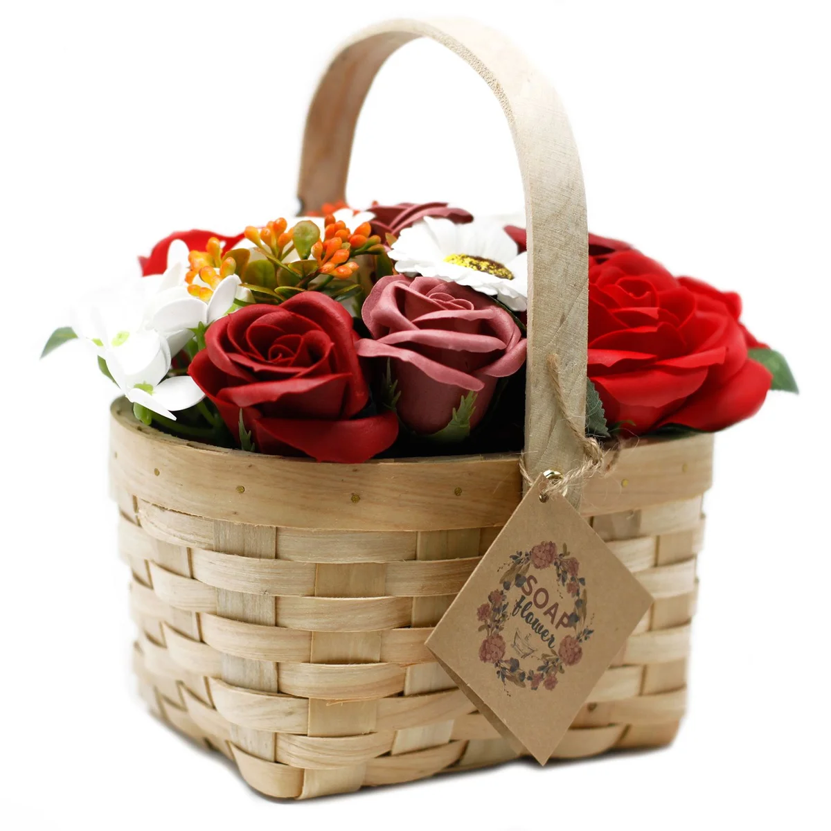 Large red bouquet arranged in a wicker basket with vibrant flowers and green leaves on a white background