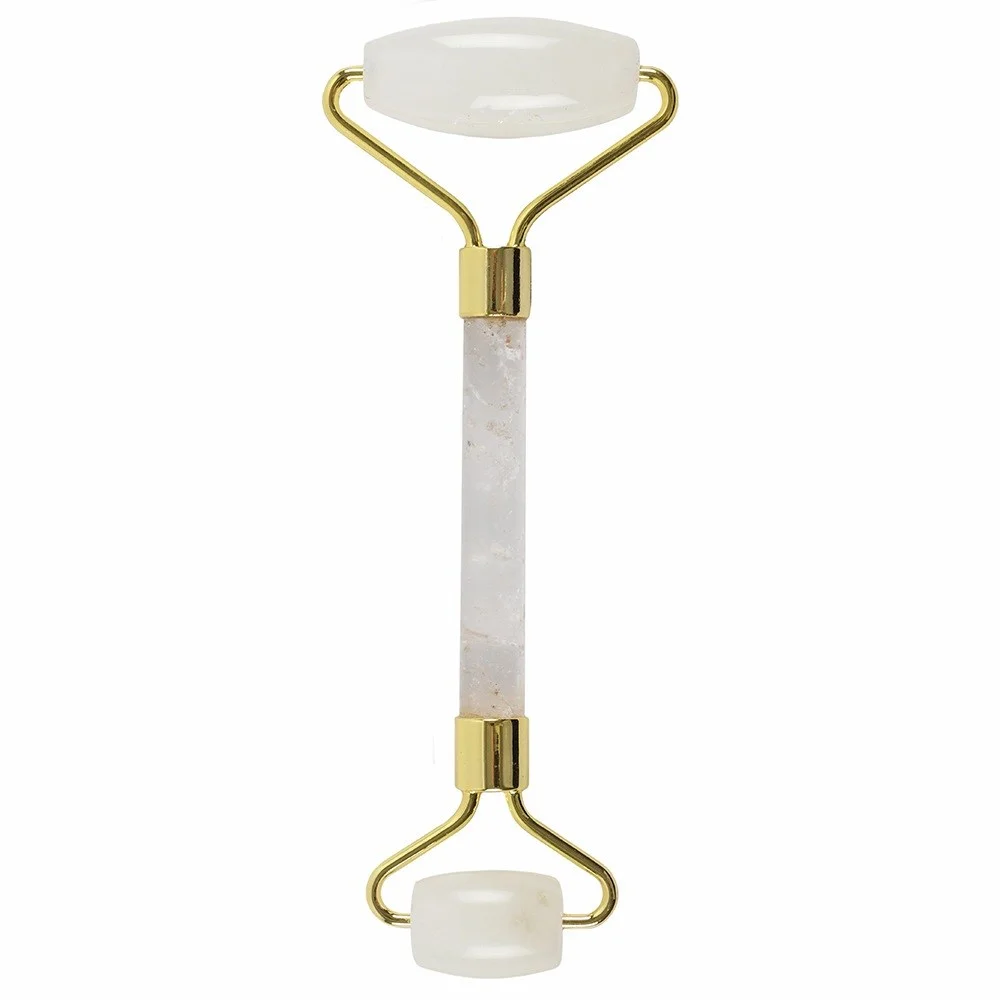 Rock Quartz gemstone face roller with dual ends, a facial massage tool for skincare and relaxation use