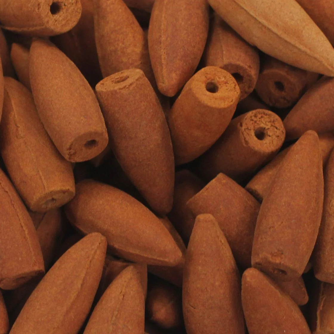 Bag of sandalwood incense cones, approx 225 pieces, packaged in a small, brown bag.