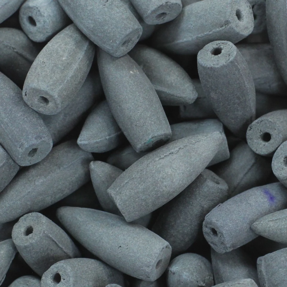 Back Flow lavender incense cones shown in a paper pouch containing about 225 cones