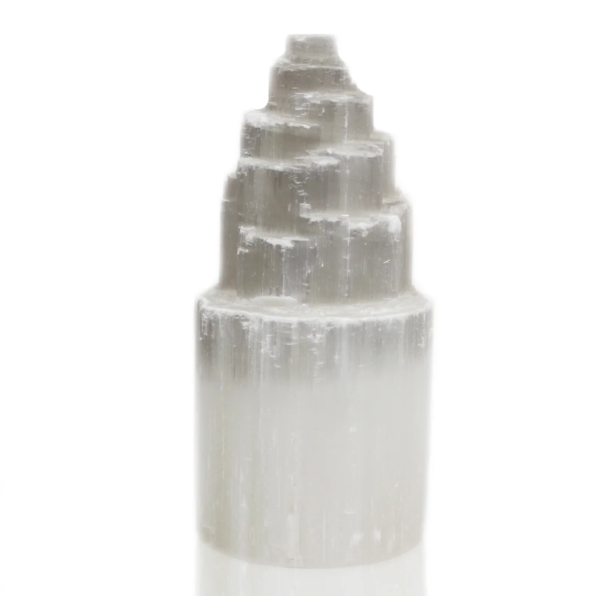 Natural 20 cm selenite lamp tower, smooth translucent surface lighting softly.