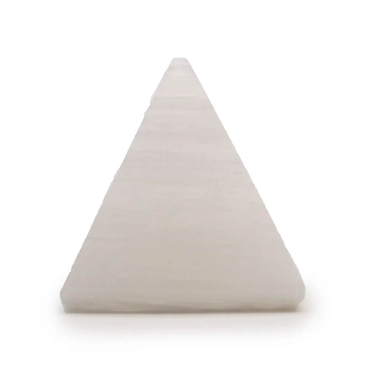 Small 5 cm selenite pyramid crystal decor with smooth, translucent white surfaces on a plain background