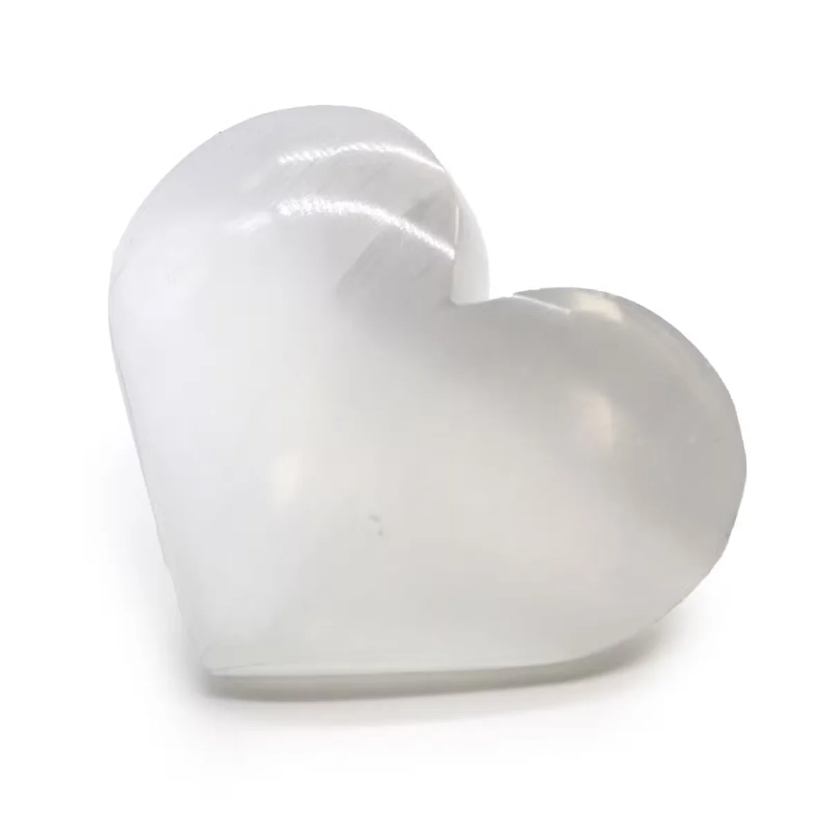 Polished selenite heart measuring 5-6 cm, a decorative selenite ornament with smooth translucent surface