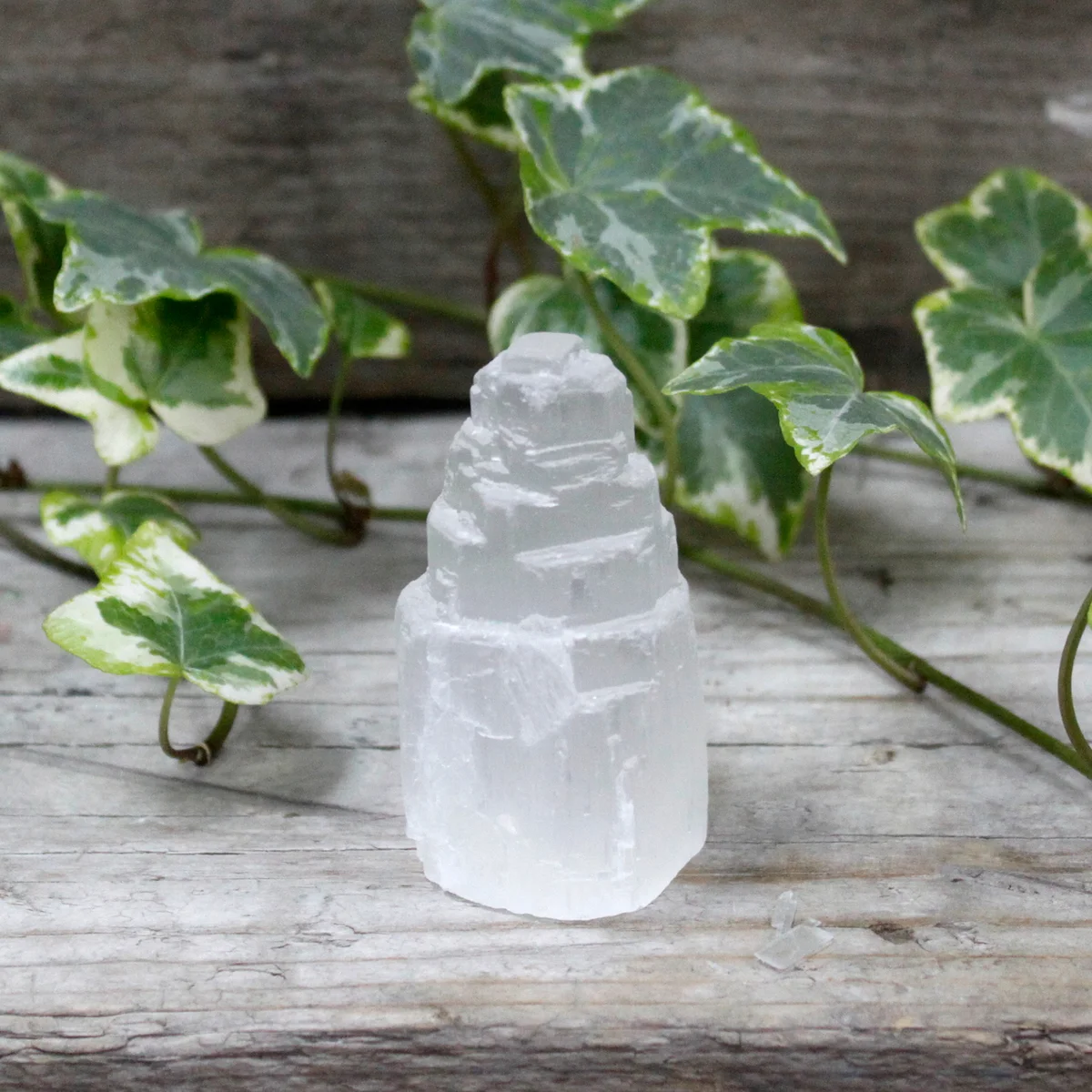 5 cm selenite ornament standing as a natural tower.
