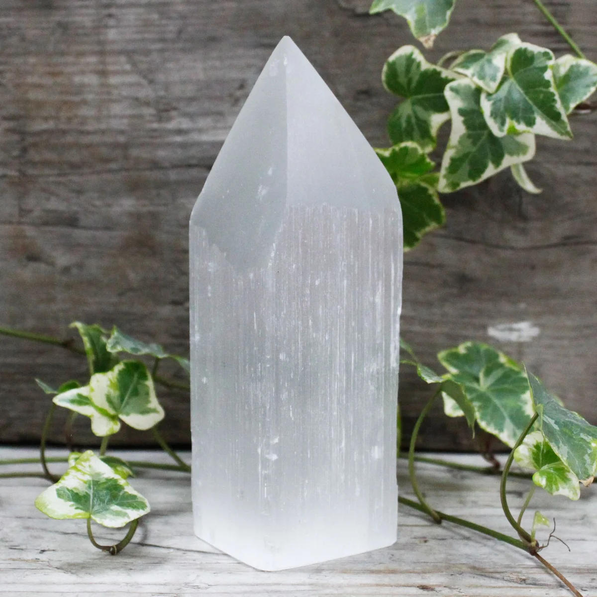 15 cm tall selenite tower figurine with pencil point design