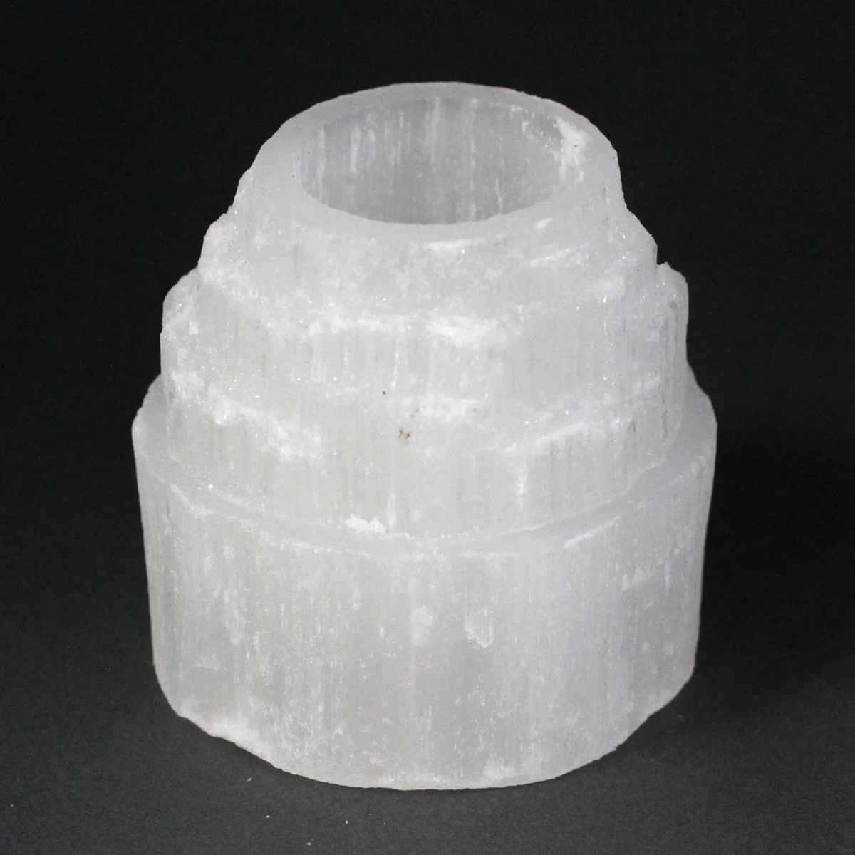 Selenite mountain top candle holder, 8 cm tall, clear crystal design.