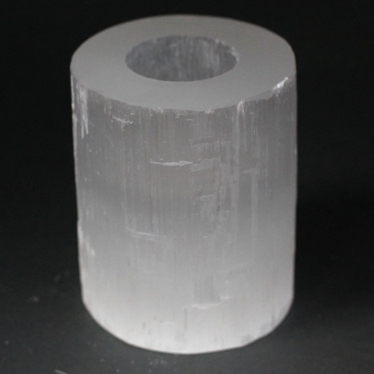 Selenite cylinder candle holder, 10 cm tall, smooth surface.