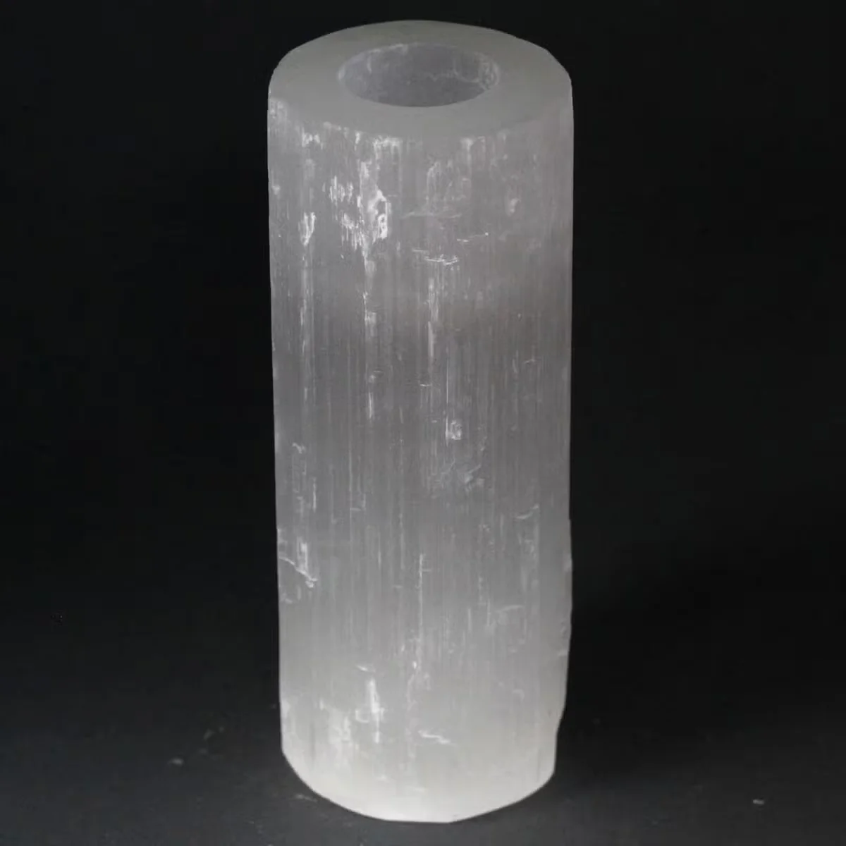 Selenite cylindrical decorative candle holder, 20 cm tall, translucent appearance.
