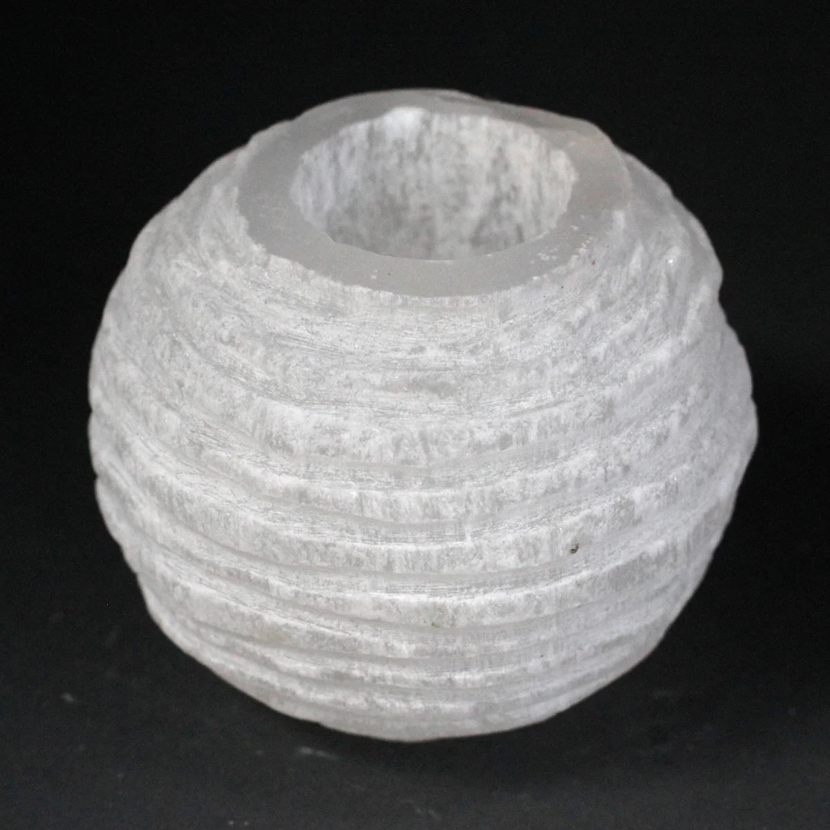 Snowball-shaped selenite 8 cm candle holder, translucent crystal