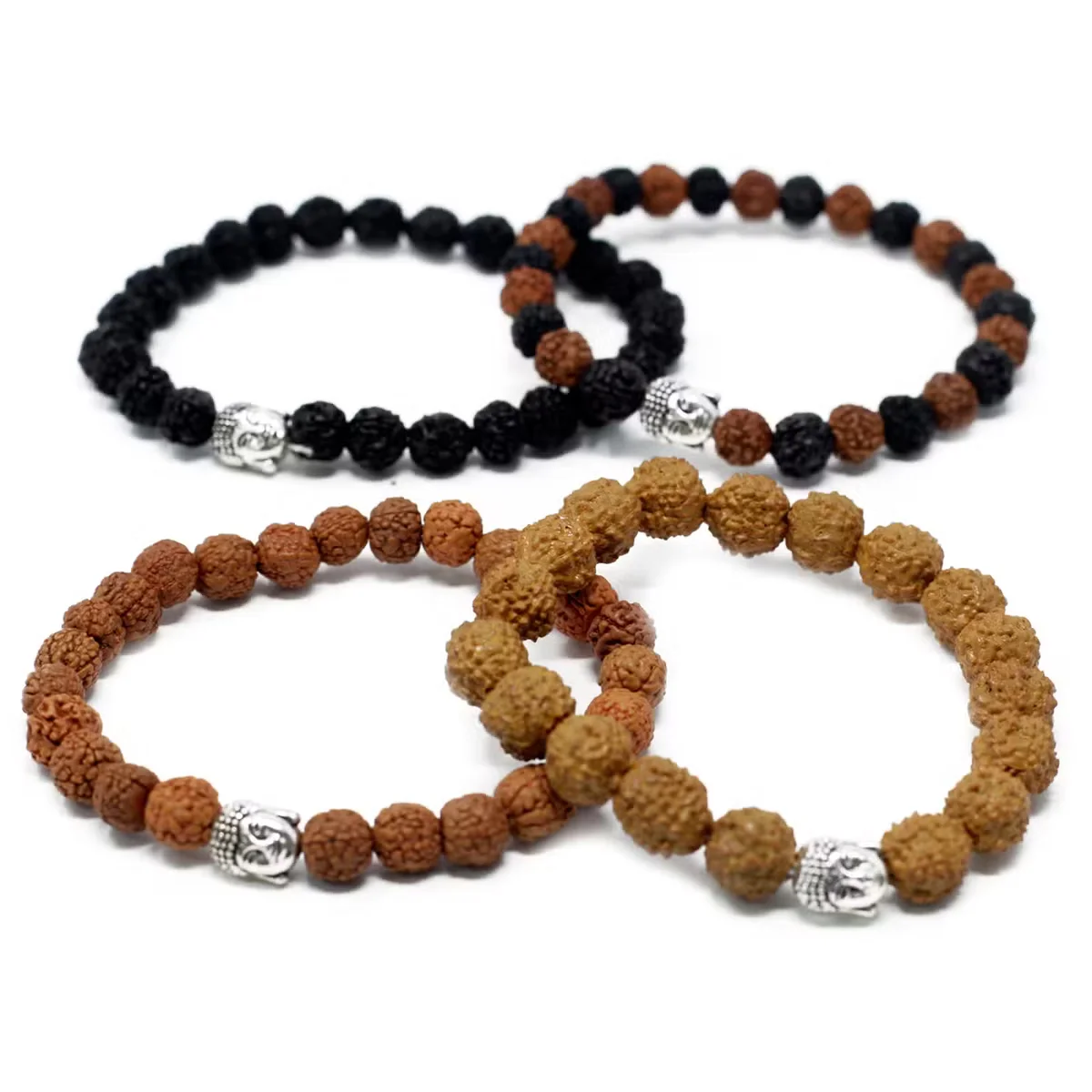 Assorted rudraksha bangles arranged on a plain background