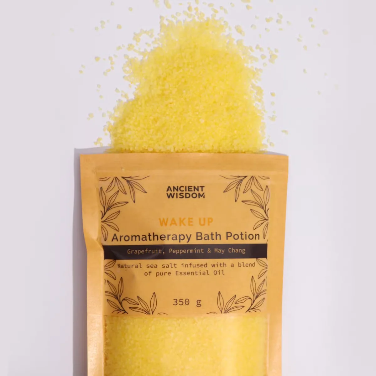 Kraft bag of 350g Wake Up bath potion with natural aromatherapy ingredients on white background