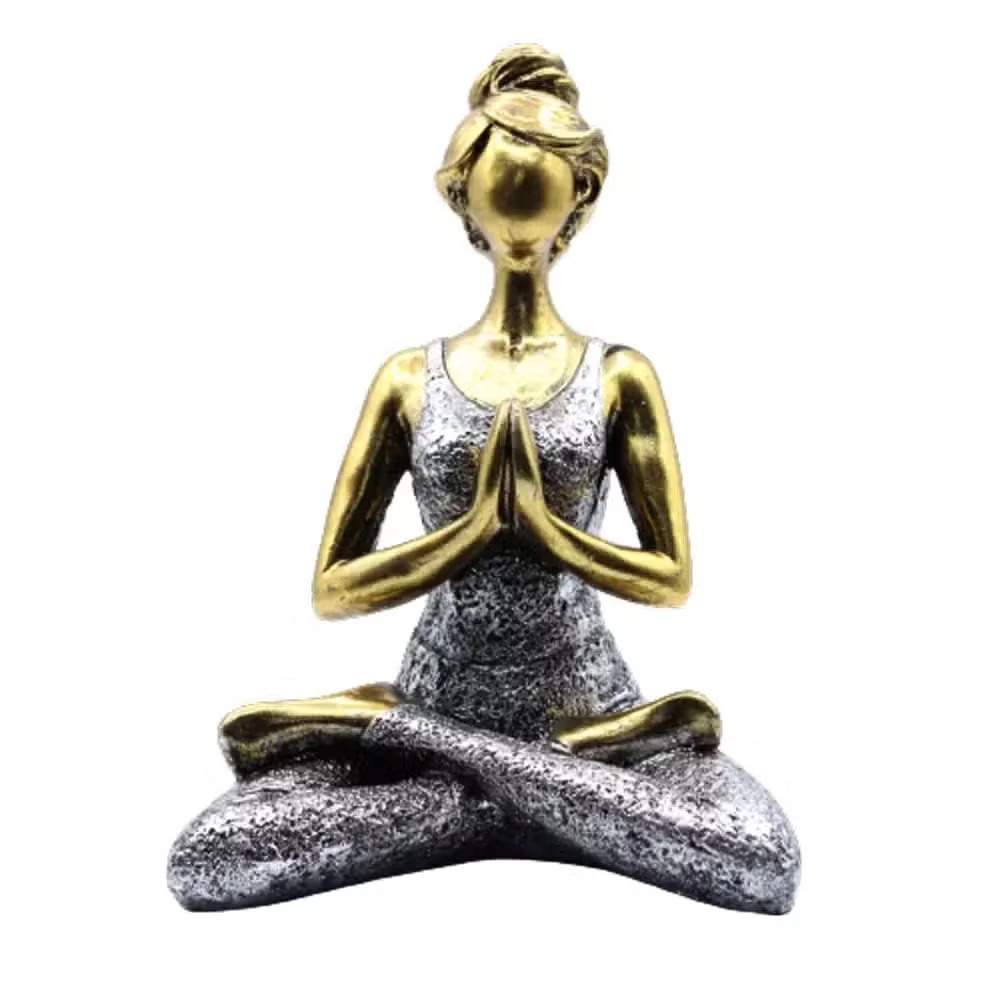 Bronze and silver decorative yoga statue of a lady figure in a seated pose, 24cm tall, on a plain background