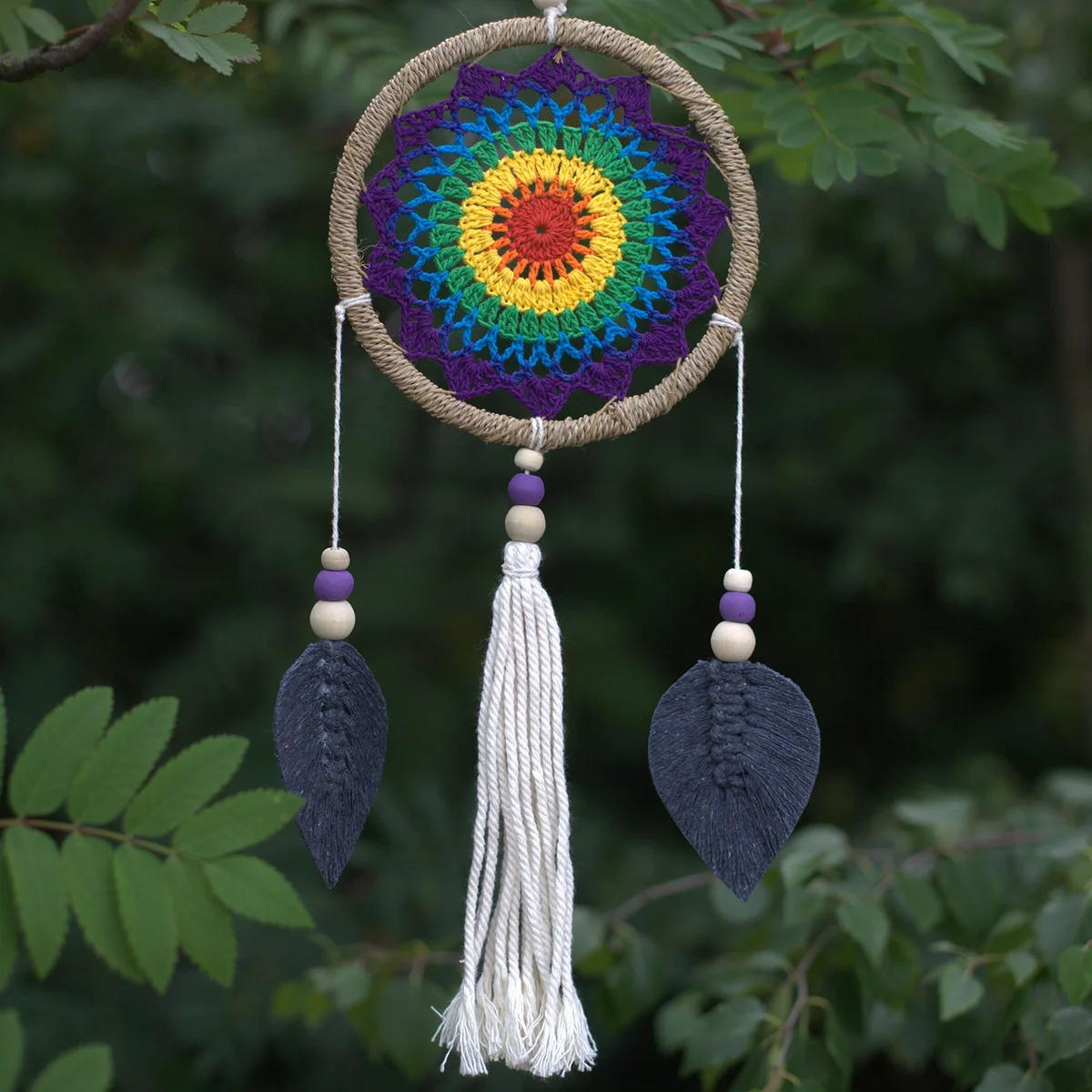 Medium dream catcher with rainbow colors and feathers, designed as elemental spirits decor for home decoration
