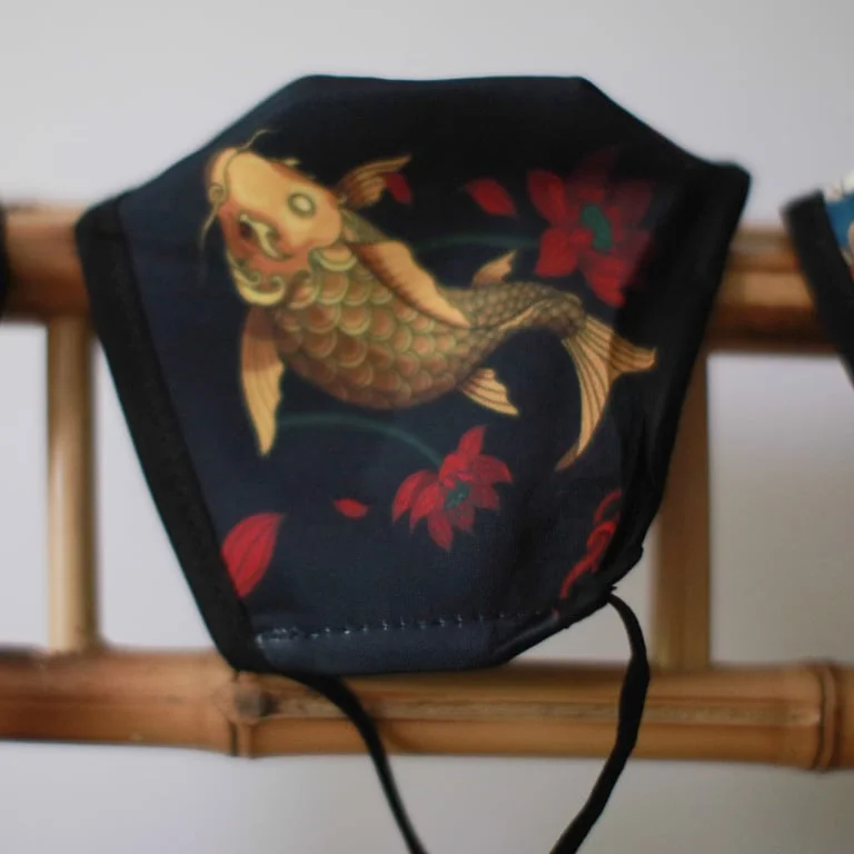 Reusable fashion face mask in golden fish design, adult size