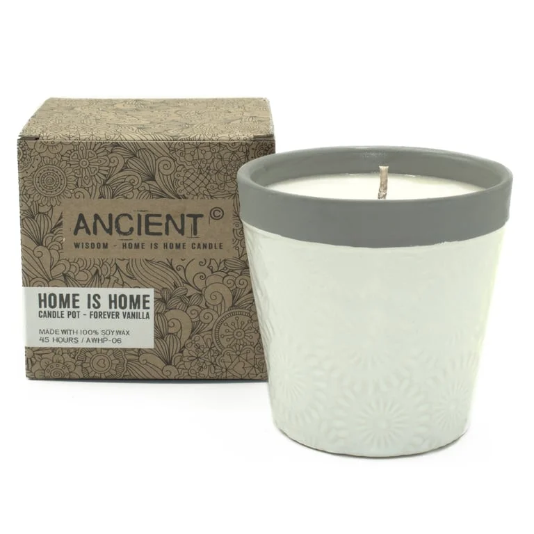 home candle pot featuring a vanilla candle in a simple pot