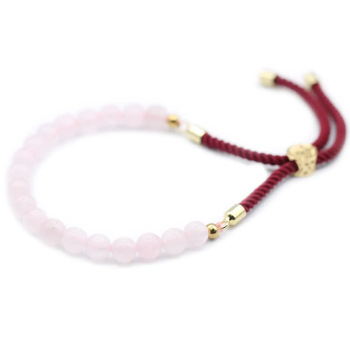 Rose quartz bracelet with 18K gold plated Bordeaux string and gemstone beads on white background
