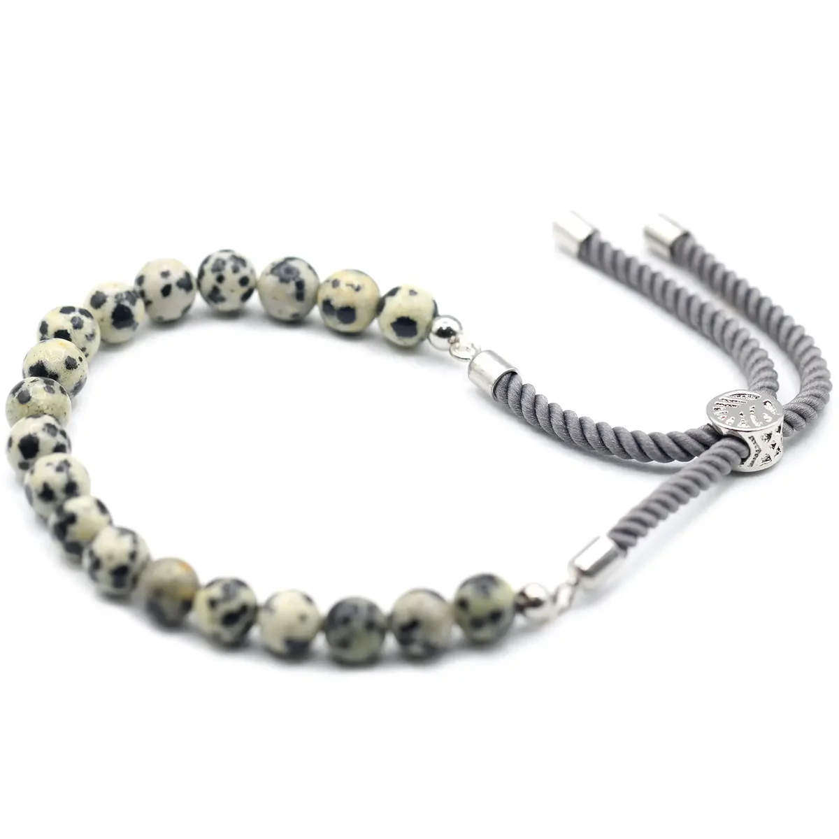 925 silver plated gemstone bracelet with Dalmatian Jasper beads on a charcoal string, laid flat on white background