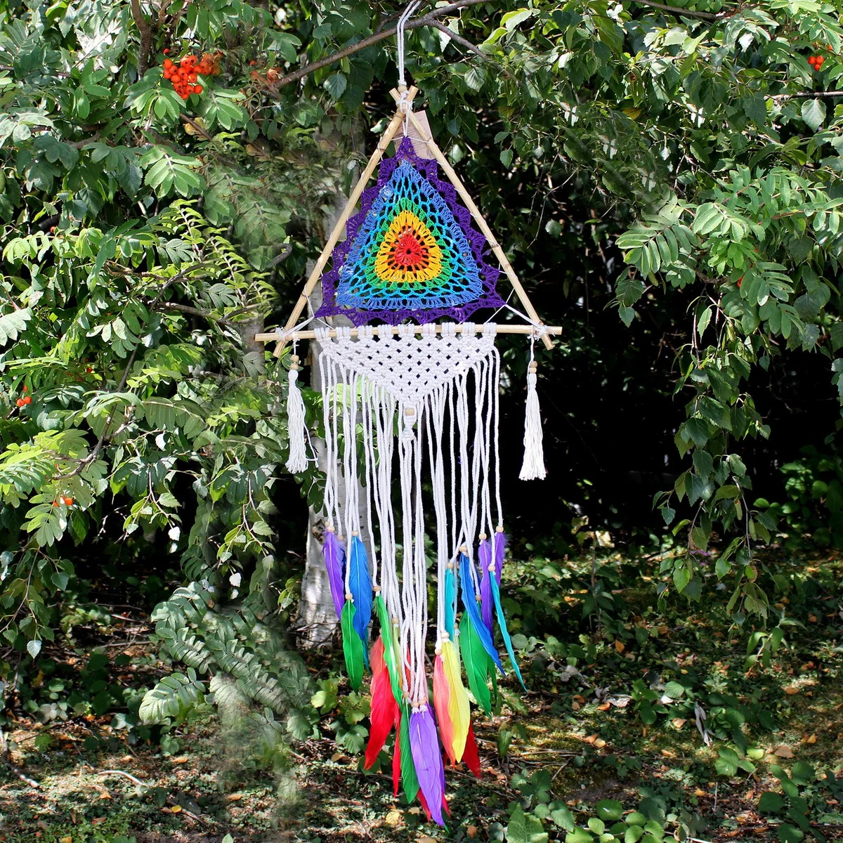 Medium multi pyramid Bali dream catchers featuring colorful woven patterns and hanging feathers on a white background