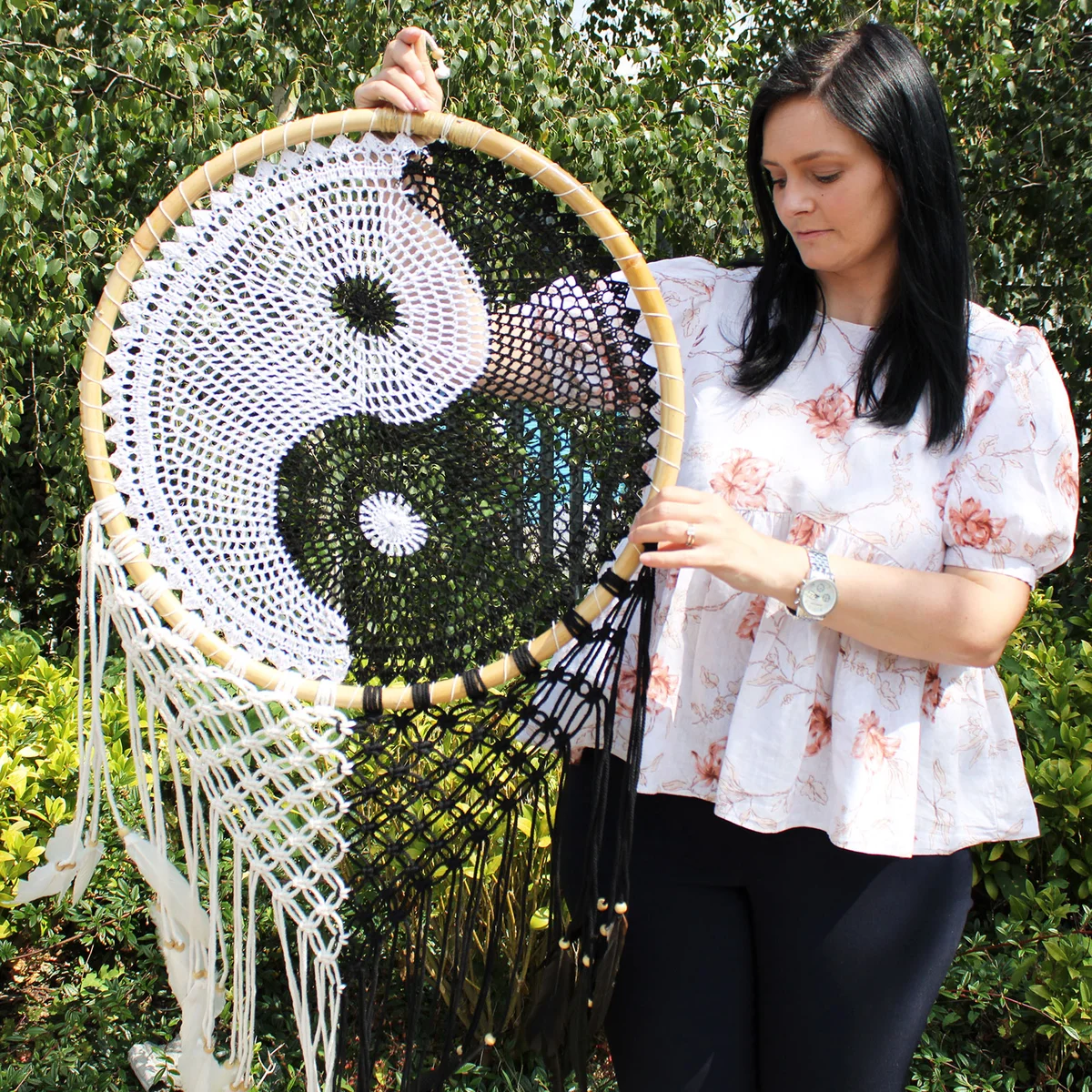 Extra large 50cm Bali dream catcher featuring a black and white ying yang wall decor design hanging on a wall