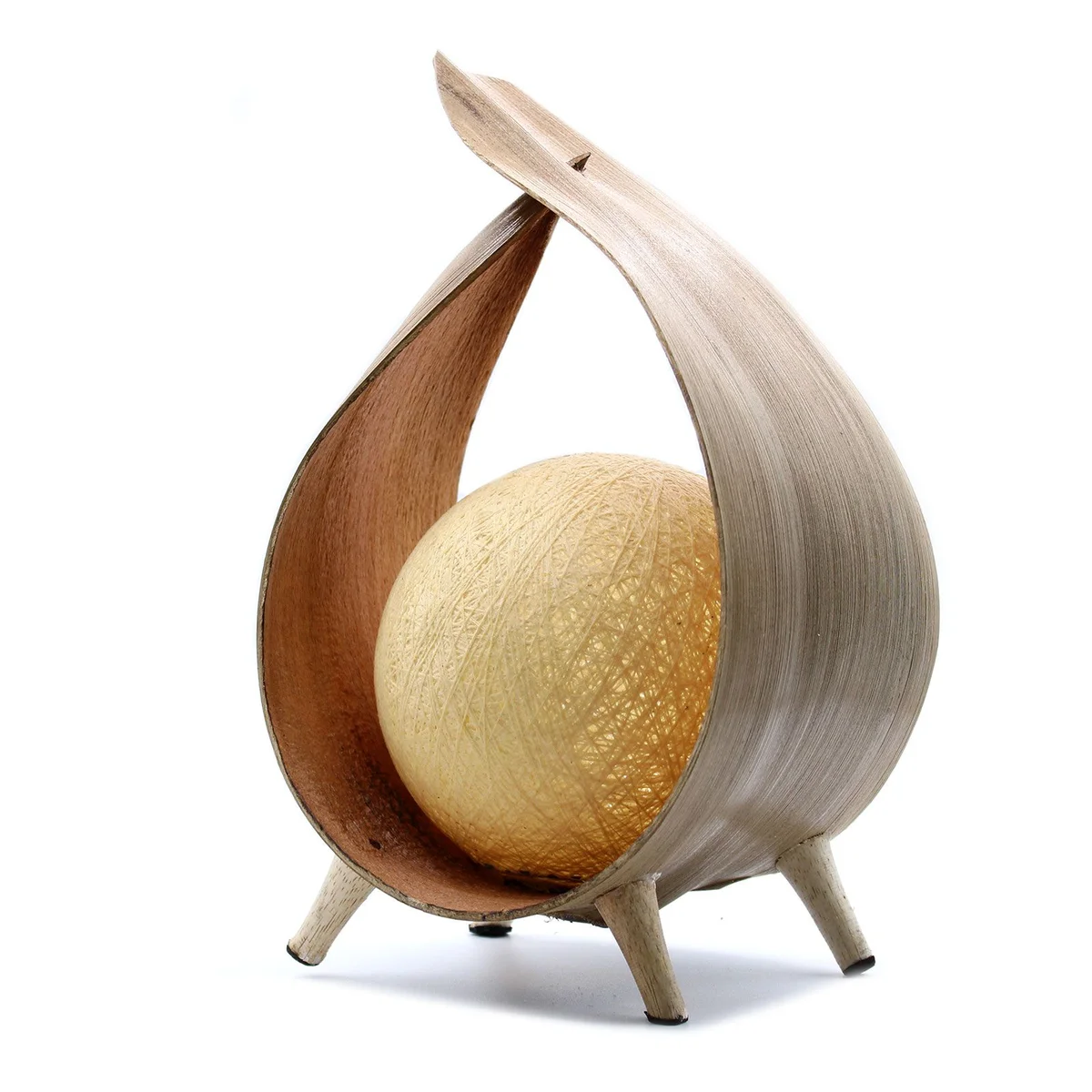Natural coconut lamp with a natural wrapover design, showcasing its organic texture and warm glow