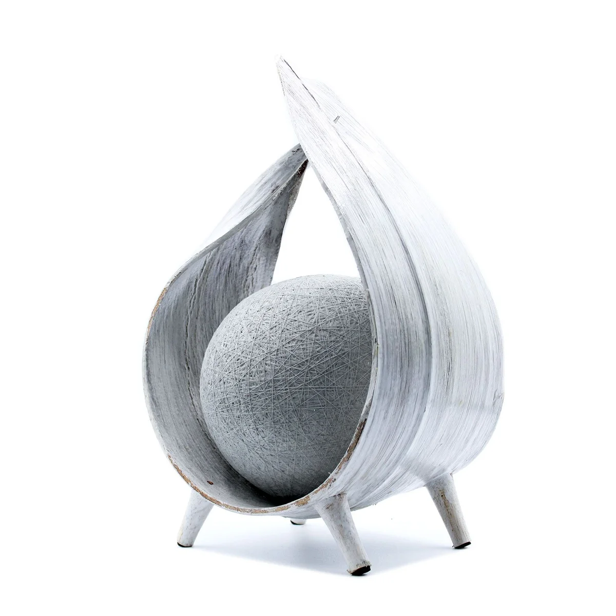 Natural coconut lamp with whitewash wrapover finish showing textured surface and soft glow lighting