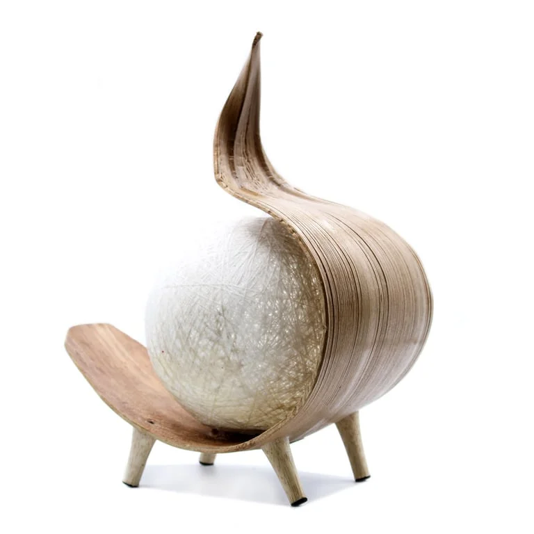 Natural coconut lamp featuring chocolate twist design.
