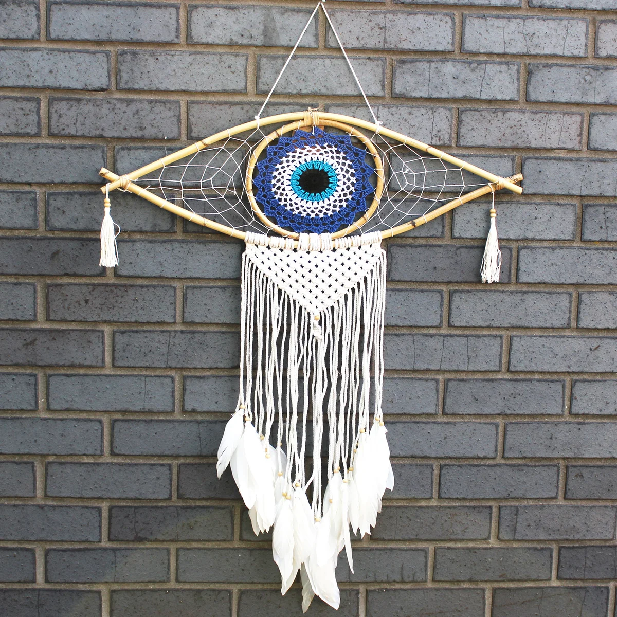 Large blue, white, black macrame wall hanging dream catcher with evil eye motif