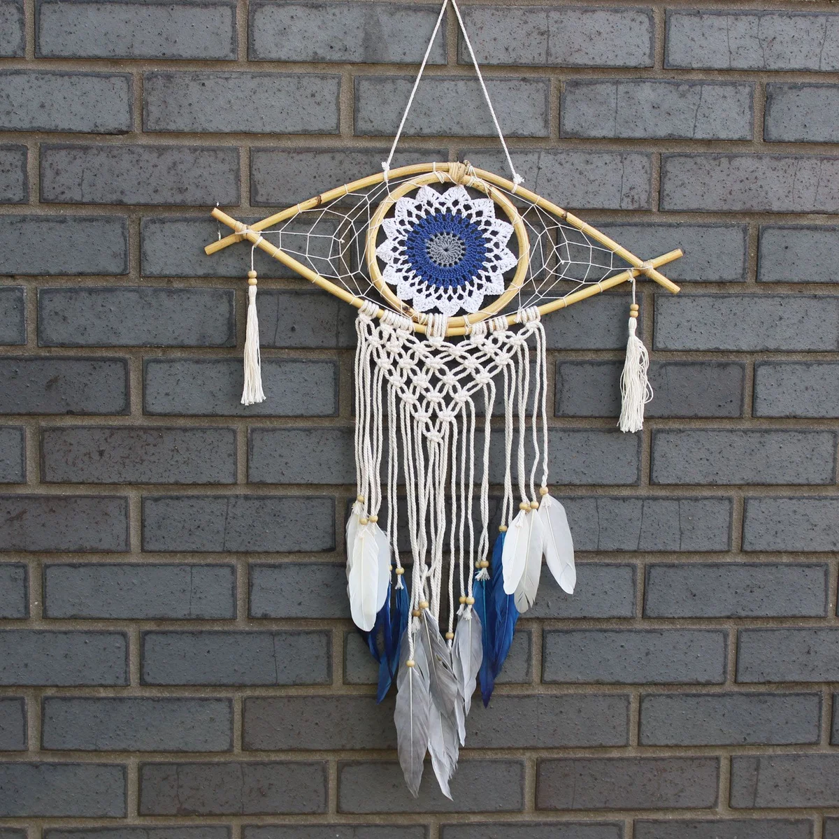 Protection dream catcher, mid‑size macrame, evil eye charm in white, blue and grey.