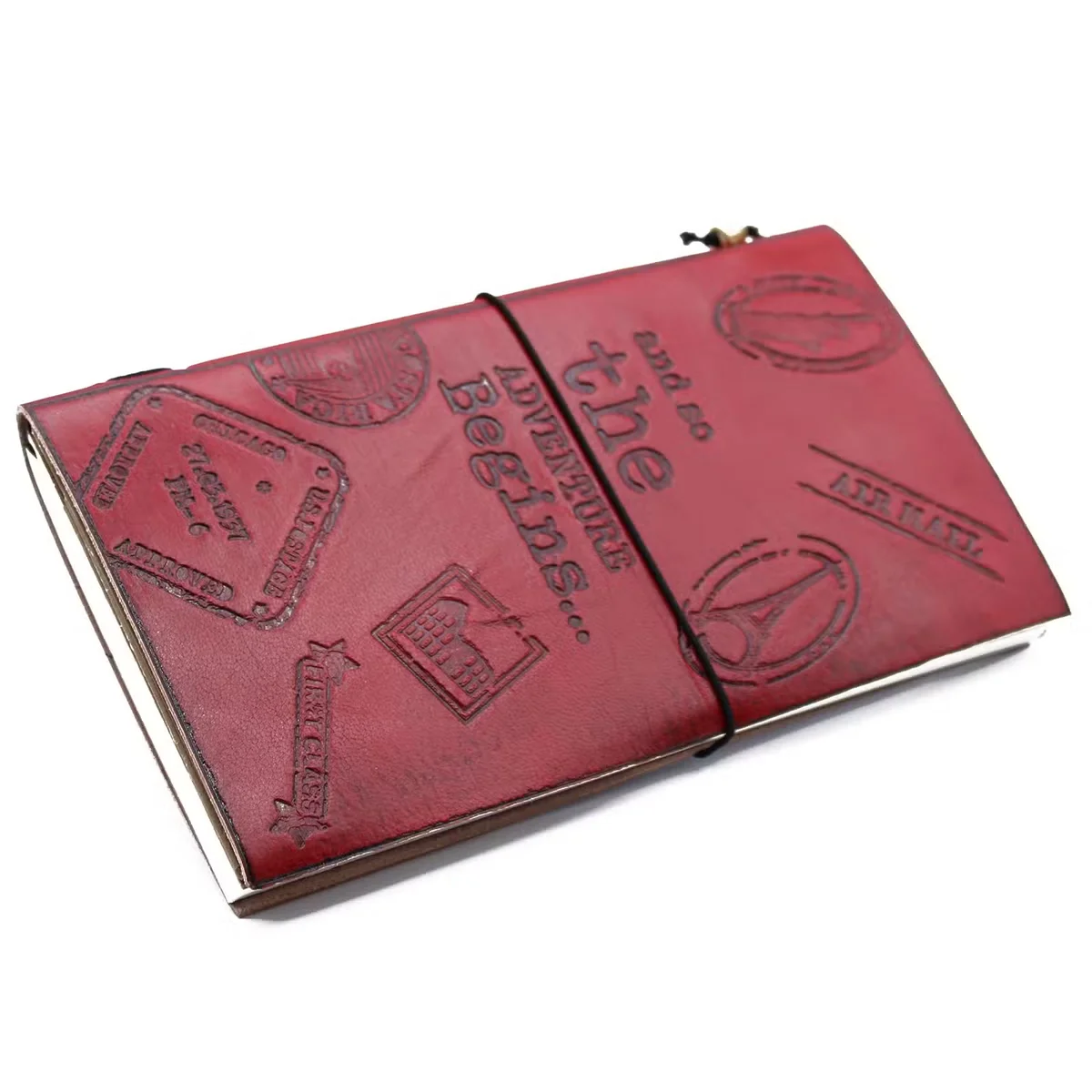 Handmade red leather journal with embossed cover, 80 page journal inside, narrow spine.