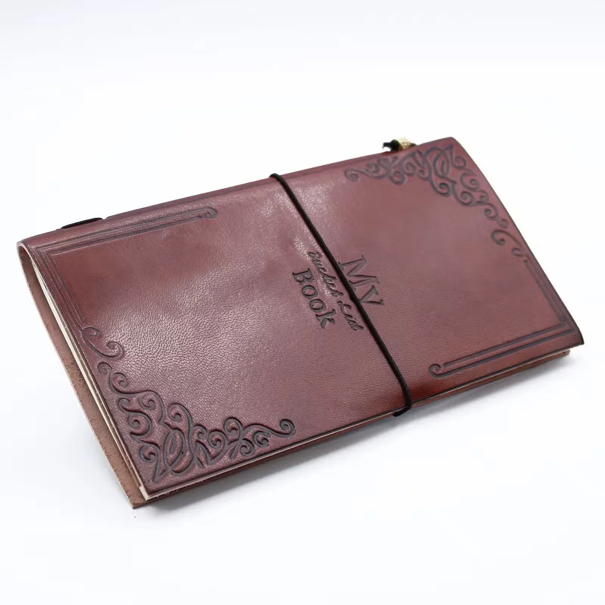 Close‑up of a brown handmade leather journal with 80 pages