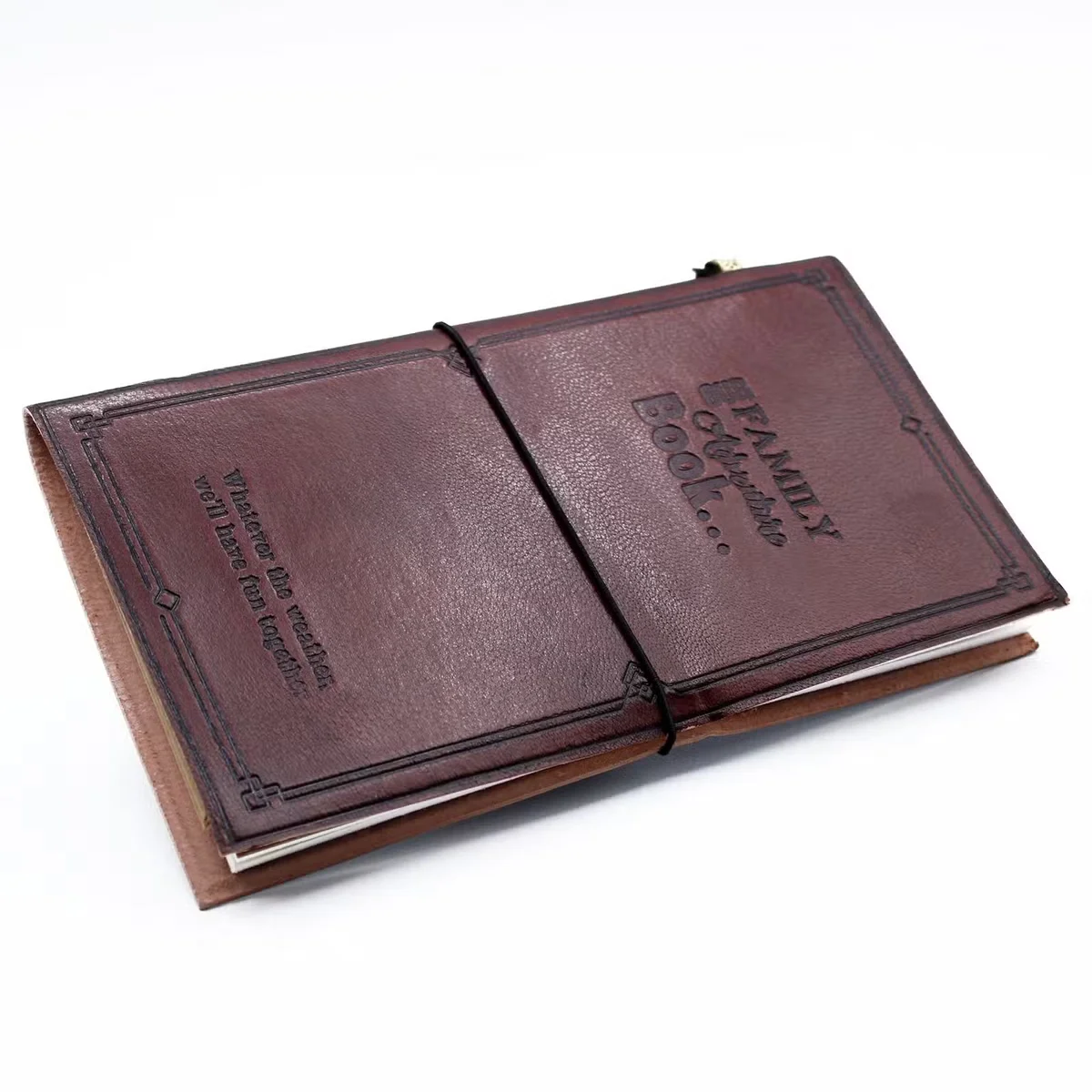 Brown handmade leather journal titled “Our Family Adventure Book”, 80 page journal.