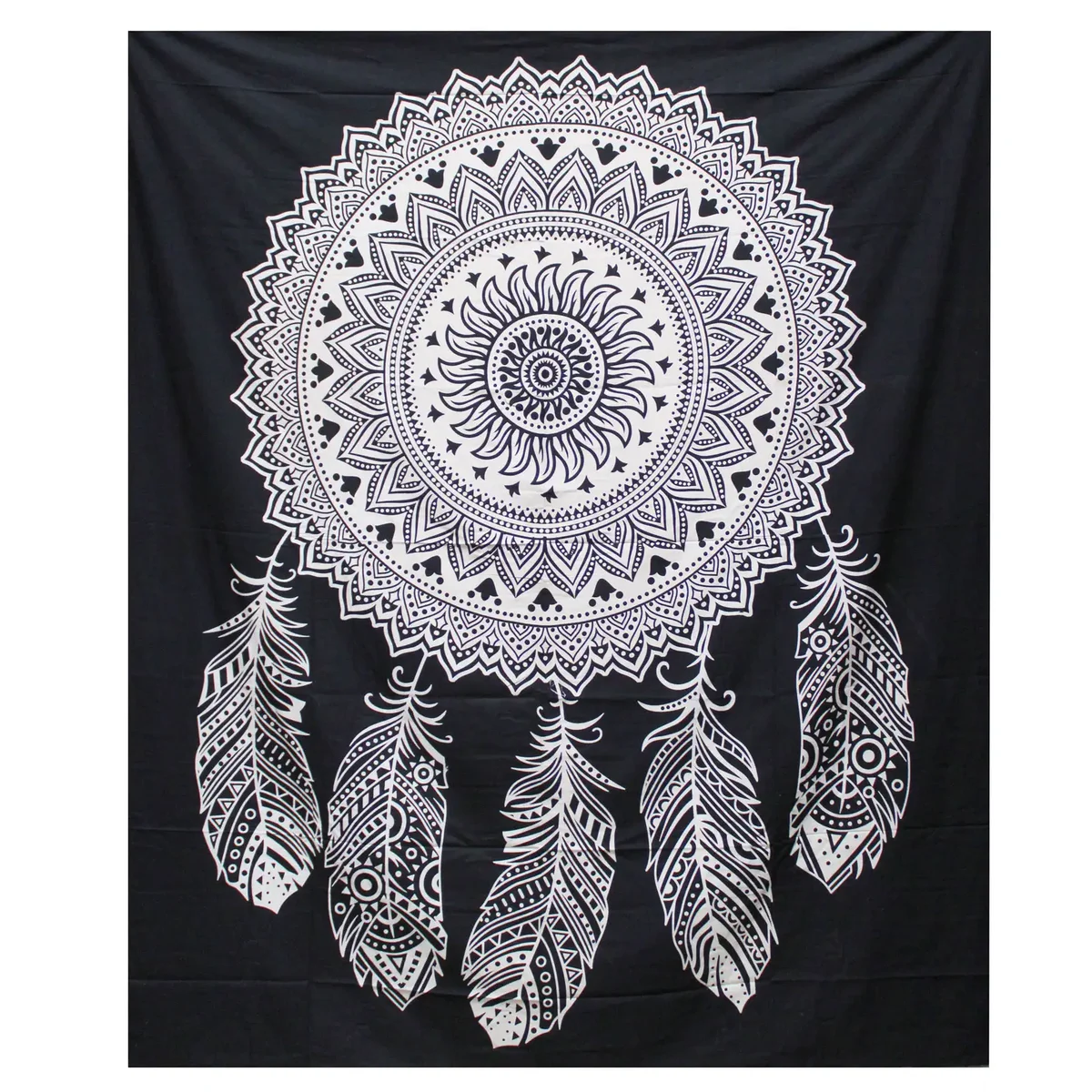 Black and white double cotton bedspread draped over bed with matching white and black dreamcatcher wall hanging on wall.