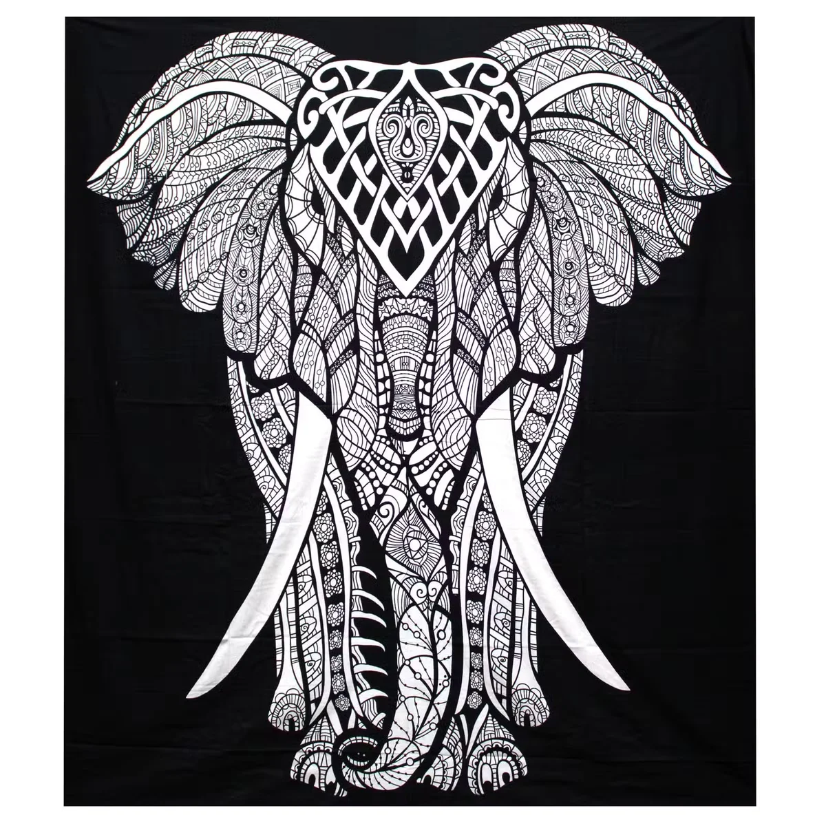 Black and white cotton bedspread set with elephant motif, flanked by matching wall hanging.