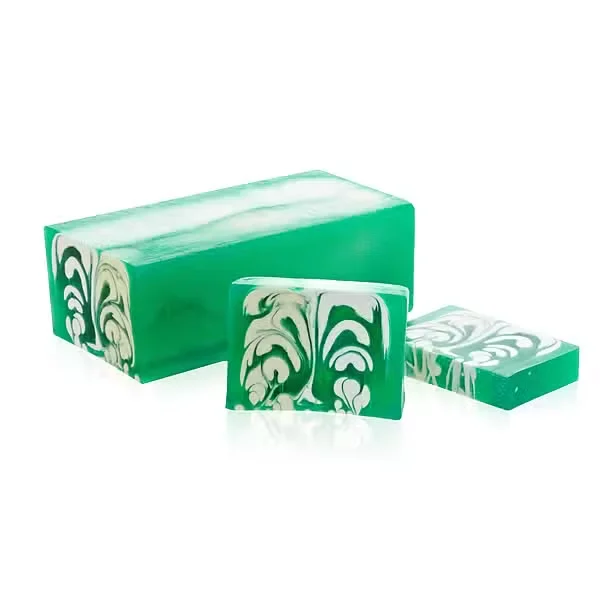 Handcrafted large soap loaf, medium orange with mango scent, creamy texture and crisp edge.