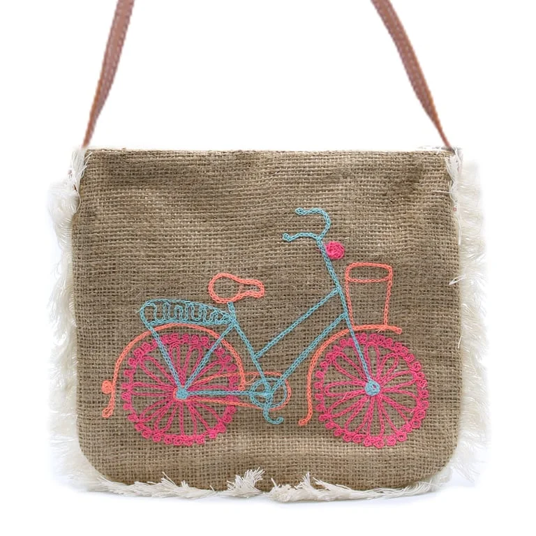 Fringe bag featuring bicycle embroidery showcases the Fab Fringe Bag design