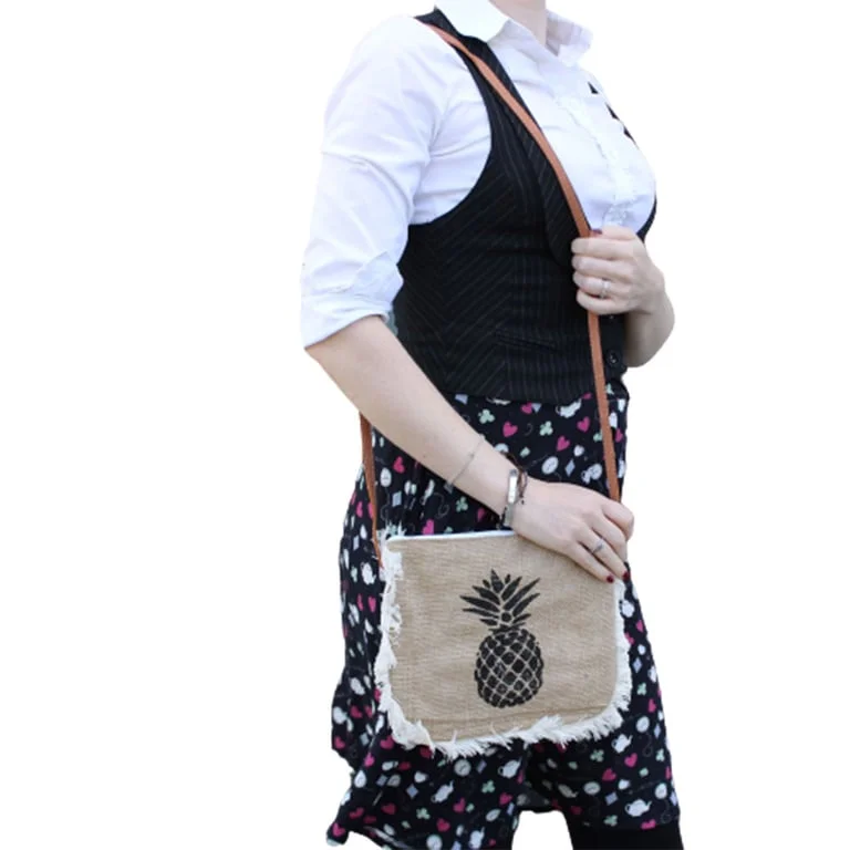 Stylish fringe handbag with pineapple print, front view of the Fab Fringe Bag.