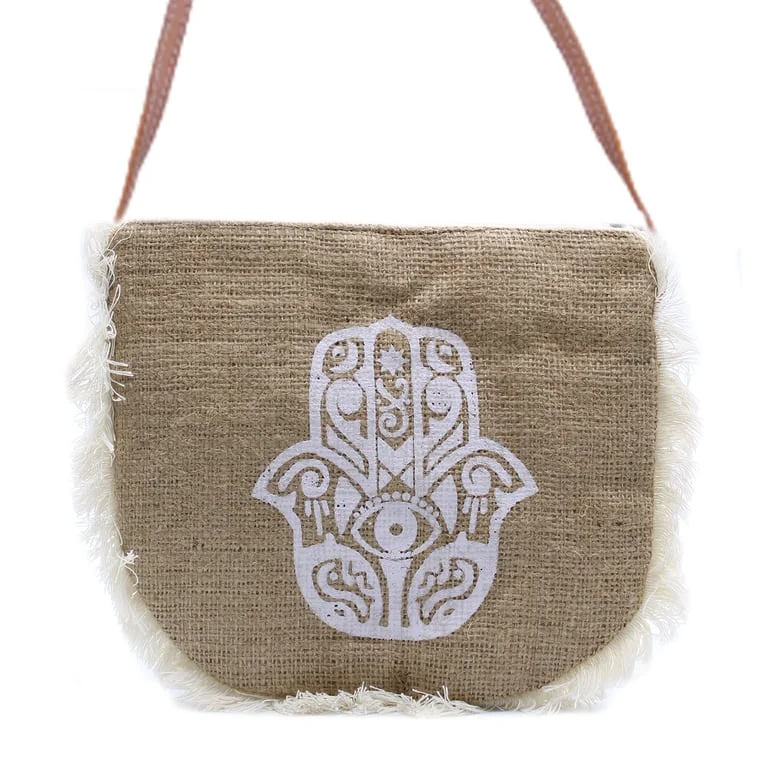 Stylish fringe bag with Hamsa print, showcasing vibrant patterns and a detailed hand‑crafted design.