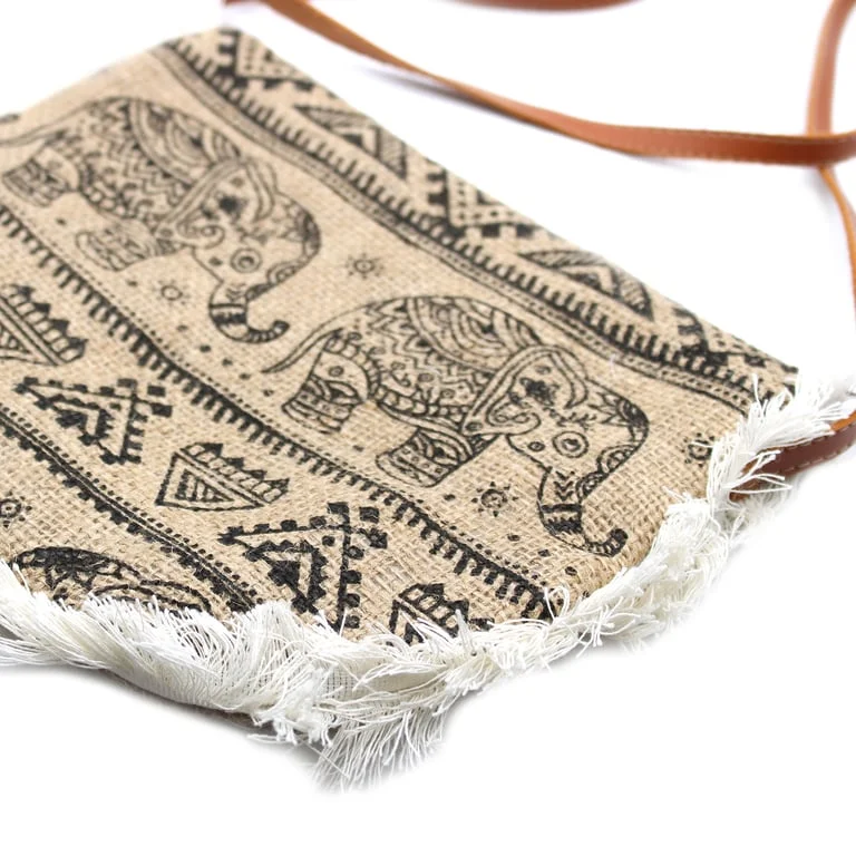 Bright fringe handbag with large elephant print.
