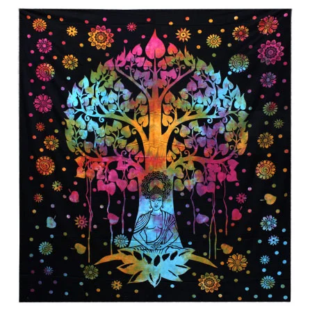 Cotton bedspread on a single bed with a Bodhi tree wall hanging decor on the wall