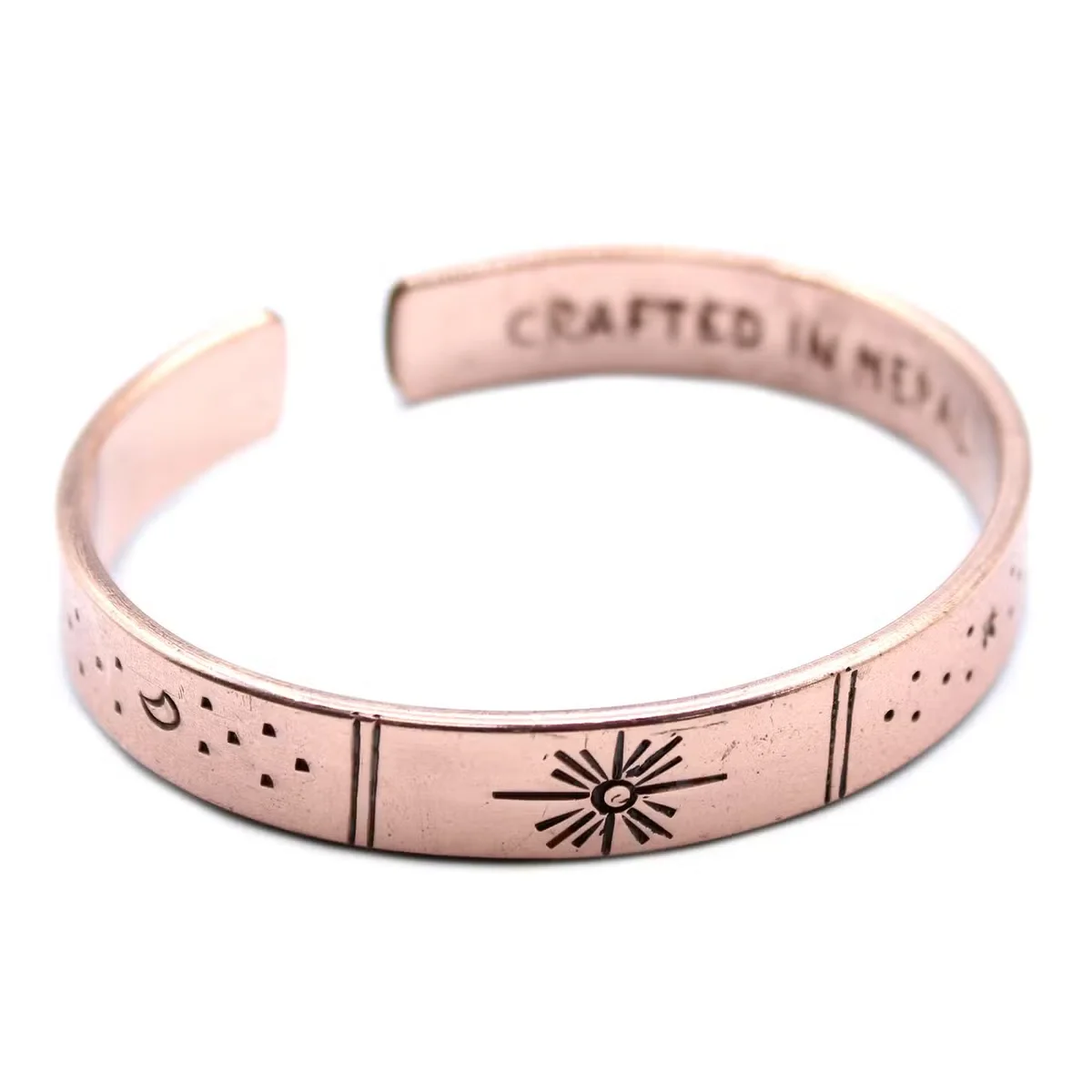 earth themed bracelet with copper band featuring galaxy, stars and Earth motifs.
