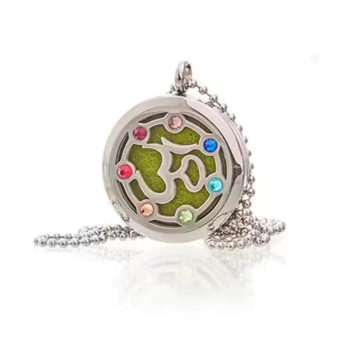Close-up of 30mm chakra necklace featuring OM symbol on aromatherapy jewellery pendant